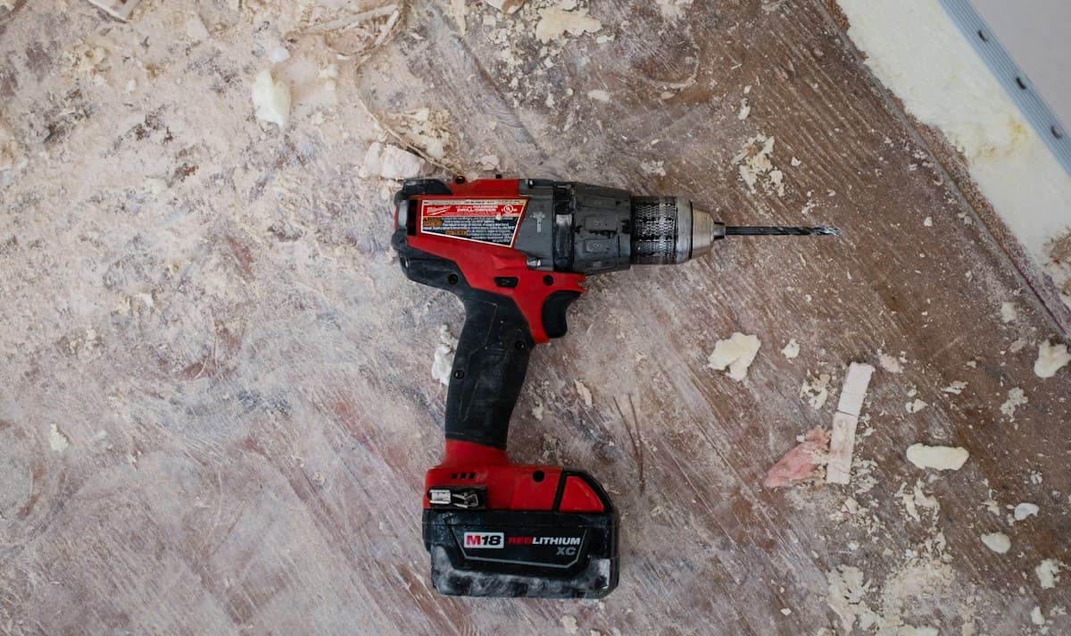 Professional power drill on a construction floor